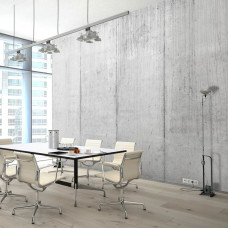 Een fotobehang met betonplaten in een industrieel ontwerp, passend in een bedrijfsruimte.