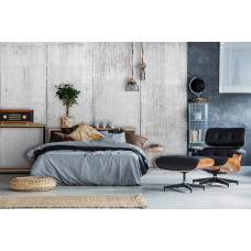 Een fotobehang met betonplaten in een industrieel ontwerp, perfect voor een moderne slaapkamer.