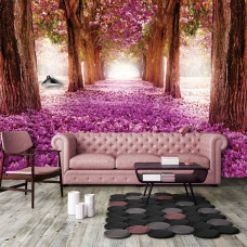 Een fotobehang met een 3D-tunnel van bloemen en bomen in de woonkamer.