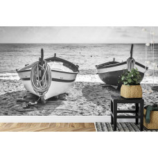 Een fotobehang met een rustgevend uitzicht op een strand met kleine bootjes, perfect voor een keuken.
