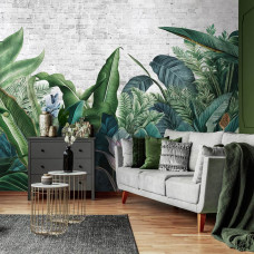 Een fotobehang met jungle planten in een vliesbehang, geschikt voor een woonkamer.