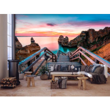 Een fotobehang van een 3D-brug naar het strand met een uitzicht op zee en rotsen in een stijlvolle woonkamer.