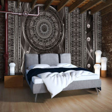 Een fotobehang van een dromenvanger met abstract mandala kunst op vliesbehang voor de slaapkamer.