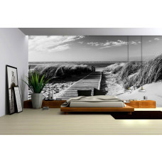 Een fotobehang van een zwart-wit duinenlandschap, ideaal voor een slaapkamer.