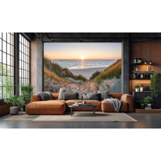 Fotobehang duinpad naar zee bij zonsondergang met helmgras langs het zandpad en de ondergaande zon aan de horizon in de woonkamer.