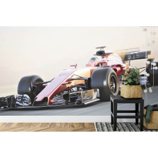 Een fotobehang van een Ferrari Formule 1-auto op topsnelheid in een spannende kinderkamer.