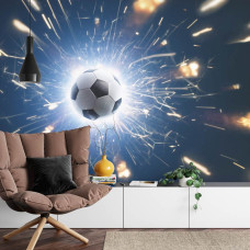 Een fotobehang met een flitsende beweging van een voetbal in een woonkamer.
