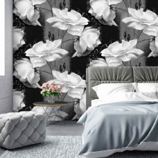 Een fotobehang met een abstract bloemenpatroon in zwart-wit, perfect voor een slaapkamer.