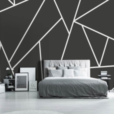 Een fotobehang van geometrische driehoeken met abstracte lijnen in een slaapkamer.