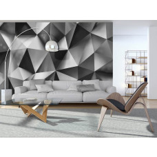Een fotobehang met geometrische 3D-vormen in een kunstzinnig ontwerp.