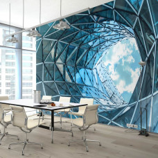 Een fotobehang van een glazen tunnel met 3D-effect in een gebouw voor het kantoor.