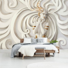 Een fotobehang van een gouden vrouw als abstract kunstwerk in de slaapkamer.
