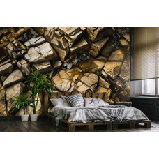 Een fotobehang met gouden rotsen en stenen in industriėle stijl voor de slaapkamer.