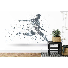 Een fotobehang met een grafische weergave van een voetballer in actie in een kinderkamer.