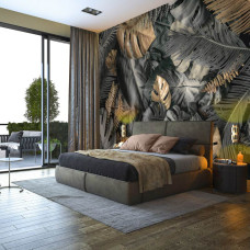 Een fotobehang met glinsterende gouden bladeren en subtiele zilveren accenten in een jungle-stijl voor de slaapkamer.
