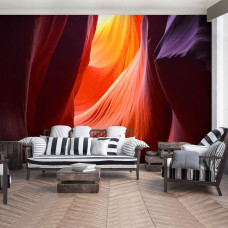 Een fotobehang van een grot met 3D-effect voor de woonkamer.