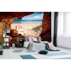 Een fotobehang met een 3D-effect van een strandpad gezien vanuit een grot in de slaapkamer.