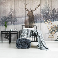 Een fotobehang van een hert in een winterbos met een rendier in een natuurlijke omgeving te zien in de kinderkamer.