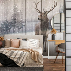 Een fotobehang van een hert in een winterbos met een rendier in een natuurlijke omgeving te zien in de slaapkamer.