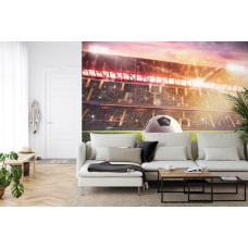 Een fotobehang met een dynamisch beeld van een voetbalstadion in een woonkamer.