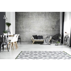 Een fotobehang met industrieel beton voor de woonkamer.