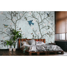 Een fotobehang van Japanse vogels in een bloesembos met kersenbloesem en appelbloesem voor de woonkamer.