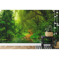 Een fotobehang met een mystieke jungle en planten in een tropische omgeving, afgebeeld in een slaapkamer.