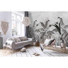 Een zwart-wit fotobehang met junglebladeren en een ruwe betonnen achtergrond, ideaal voor een woonkamer.
