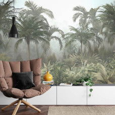 Een fotobehang met een weelderig junglelandschap vol palmbomen, afgebeeld in een woonkamer.