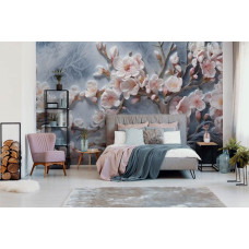 Een fotobehang van kersenbloesem bloemen op takken in sakura stijl in de slaapkamer.