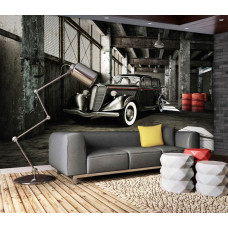Een fotobehang van een klassieke auto in een oude garage voor de kinderkamer.