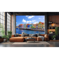 Fotobehang met kleurrijke gevels aan het water van Curaçao in een stijlvolle woonkamer.