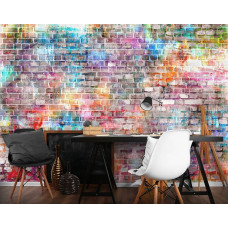Een fotobehang van een kleurrijke graffiti-muur met bakstenen en muurschildering te zien in een kantoor.