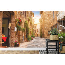 Een fotobehang met een romantische straat in Rome met een klassieke uitstraling, afgebeeld in een eetkamer.