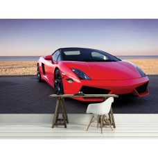 Een fotobehang met een rode Lamborghini aan zee en strand voor de slaapkamer.