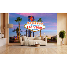 Fotobehang Las Vegas met iconisch welkomstbord en kleurrijke avondlucht in de huiskamer.