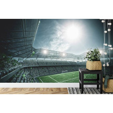 Een fotobehang met een levendig voetbalstadion vol sfeer in een kinderkamer.