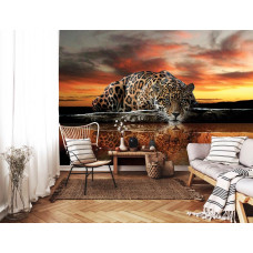Een fotobehang met een luipaard en panter in jachtpositie met een cheetah en jaguar voor de woonkamer.