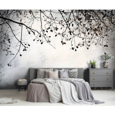 Fotobehang met subtiele takken in minimalistische stijl aan de muur van een rustige slaapkamer.