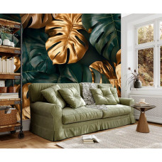 Fotobehang met grote monstera bladeren en gouden details in een moderne woonkamer.