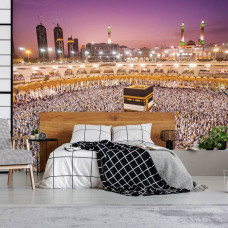 Een fotobehang van moslimpelgrims tijdens de Tawaaf in een slaapkamer.