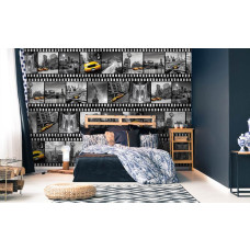 Een fotobehang van een filmstrip van New York met het Vrijheidsbeeld voor de slaapkamer.