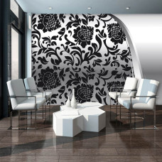 Een fotobehang met een abstract zwart-wit ontwerp, waarin versieringen centraal staan.