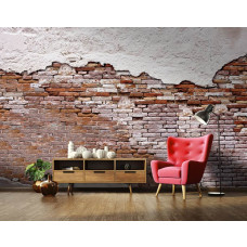 Fotobehang met daarop een oude bakstenen muur met boven en onder cement, weergegeven in de woonkamer.