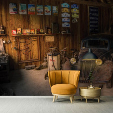 Een fotobehang van een vintage Amerikaanse auto in een oude werkplaats, ideaal voor een slaapkamer.