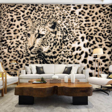 Een fotobehang met een panterprint en luipaard patroon voor de woonkamer.
