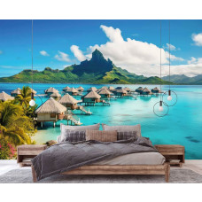 Een fotobehang van een paradijselijk eiland met een strand en turquoise zee, ideaal voor een slaapkamer.
