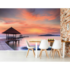 Een fotobehang van een pier langs de zee voor de keuken.