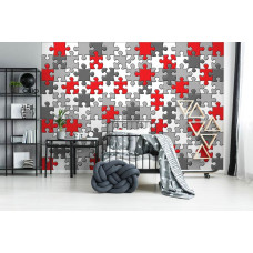 Een fotobehang met een kleurrijk puzzelpatroon, dat de babykamer opfleurt.