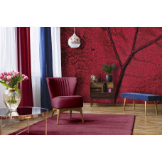 Een fotobehang van een rood blad in natuurlijke omgeving te zien in de huiskamer.